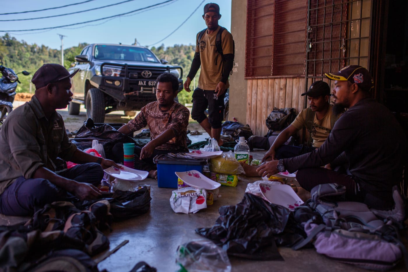 An anti-poaching patrol team gets ready to enter the forest of Royal Belum State Park for several days, Malaysia.