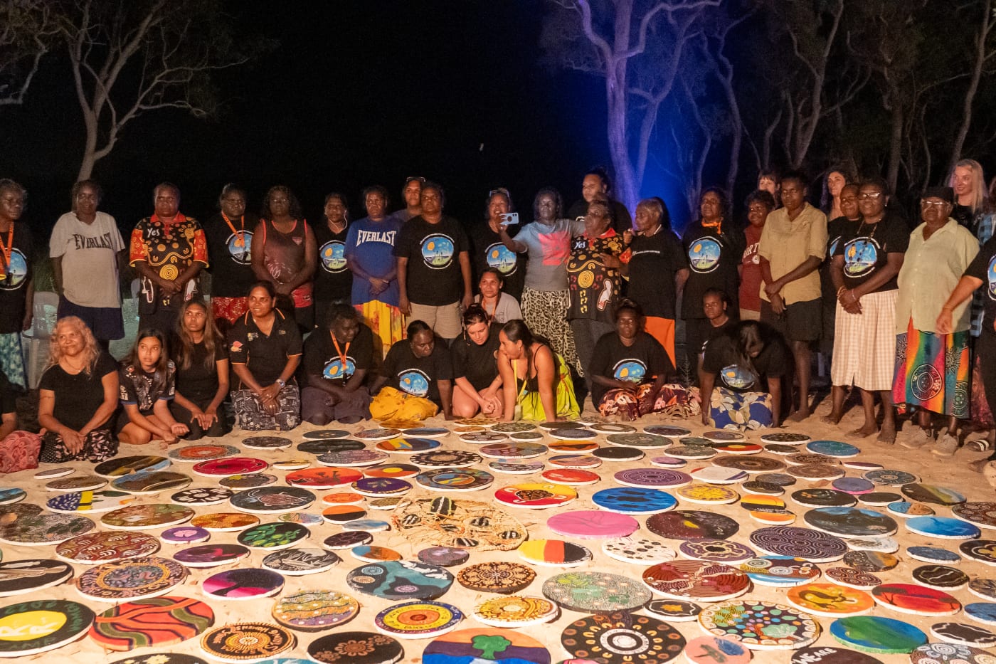 Participants showcasing their artwork at the 2023 Strong Women for Healthy Country Forum