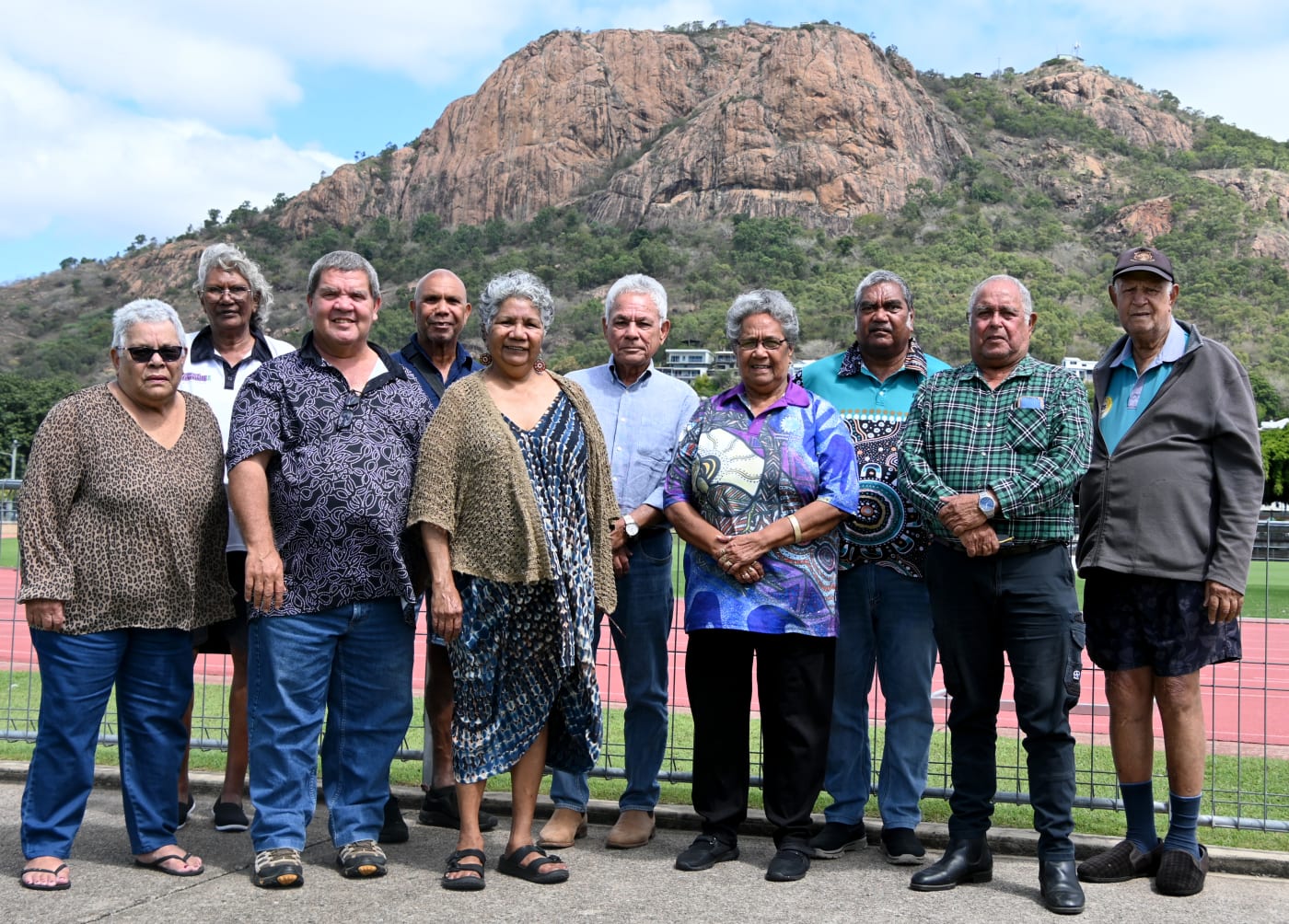 Ten members of the NQ Dry Tropics Traditional Owner Management Group.
Left to right: Sheryl Wake (Gia), Virginia Wyles (Wulgurukaba), Richard Hoolihan (Chair) (Gugu Badhun), Reg Kerr (Gudjala), Jim Gaston (Juru), Josephine Smallwood (Wangan and Jagalingou), Trevor Robinson (Bidjara), Dorothy Savage (Birriah0, Eddie Smallwood (Bindal), Jim Gaston (Juru), Charles Morganson (Warrungnu)