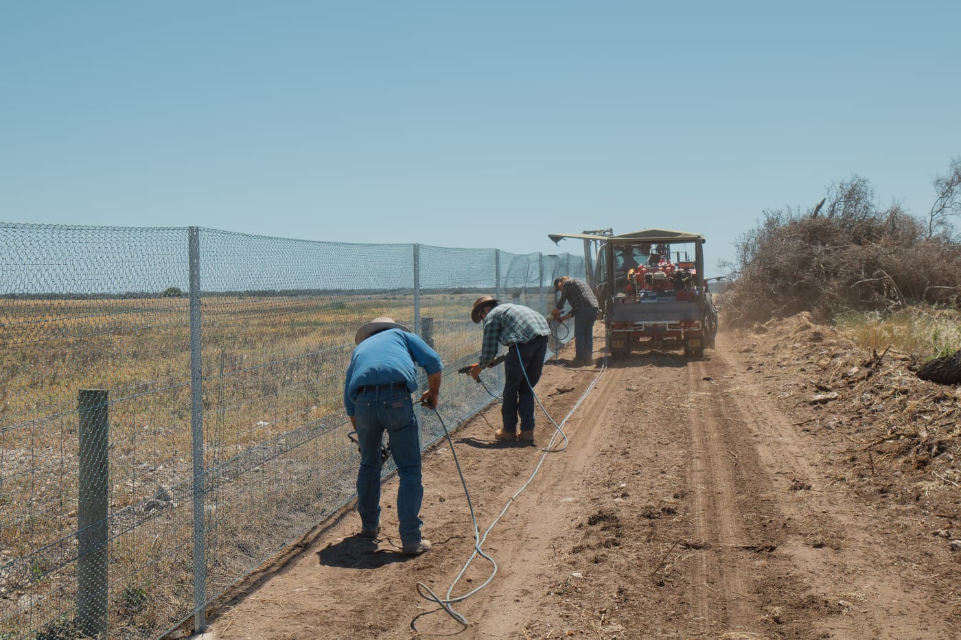 Contractors building the predator-control fence on the Yorke Peninsula in South Australia as part of the Great Southern Ark project