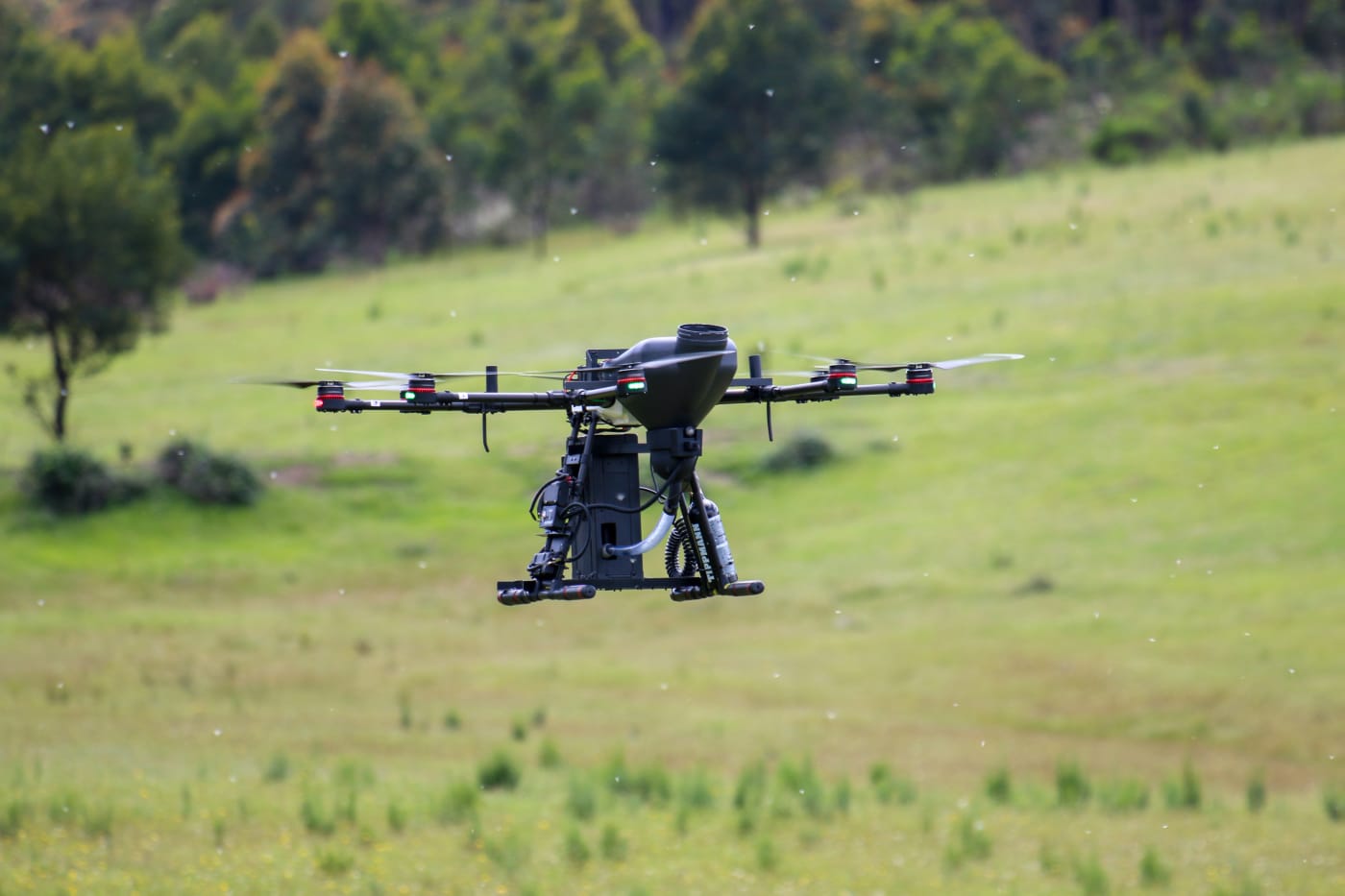 AirSeed Technologies demonstrate their seed-dispersing drones at a property at Marulan.