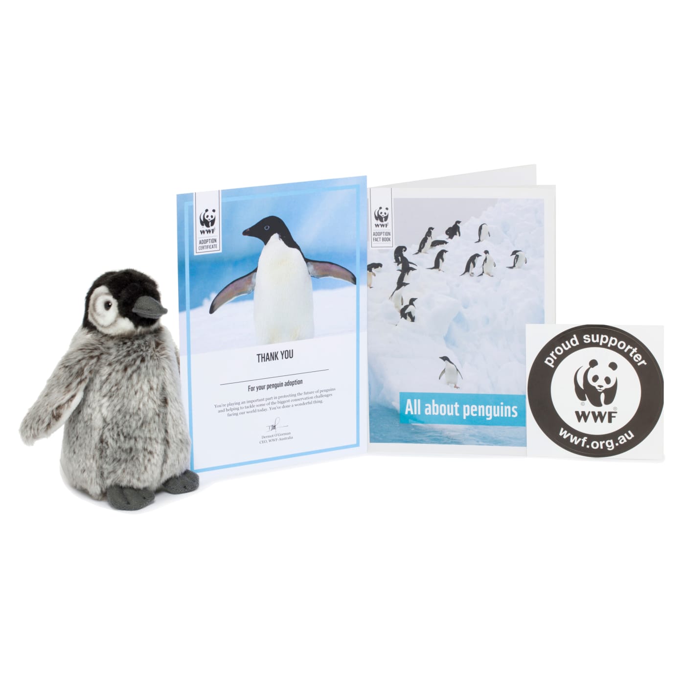 Contents of penguin adoption pack, including penguin plushie, adoption certificate and penguin booklet