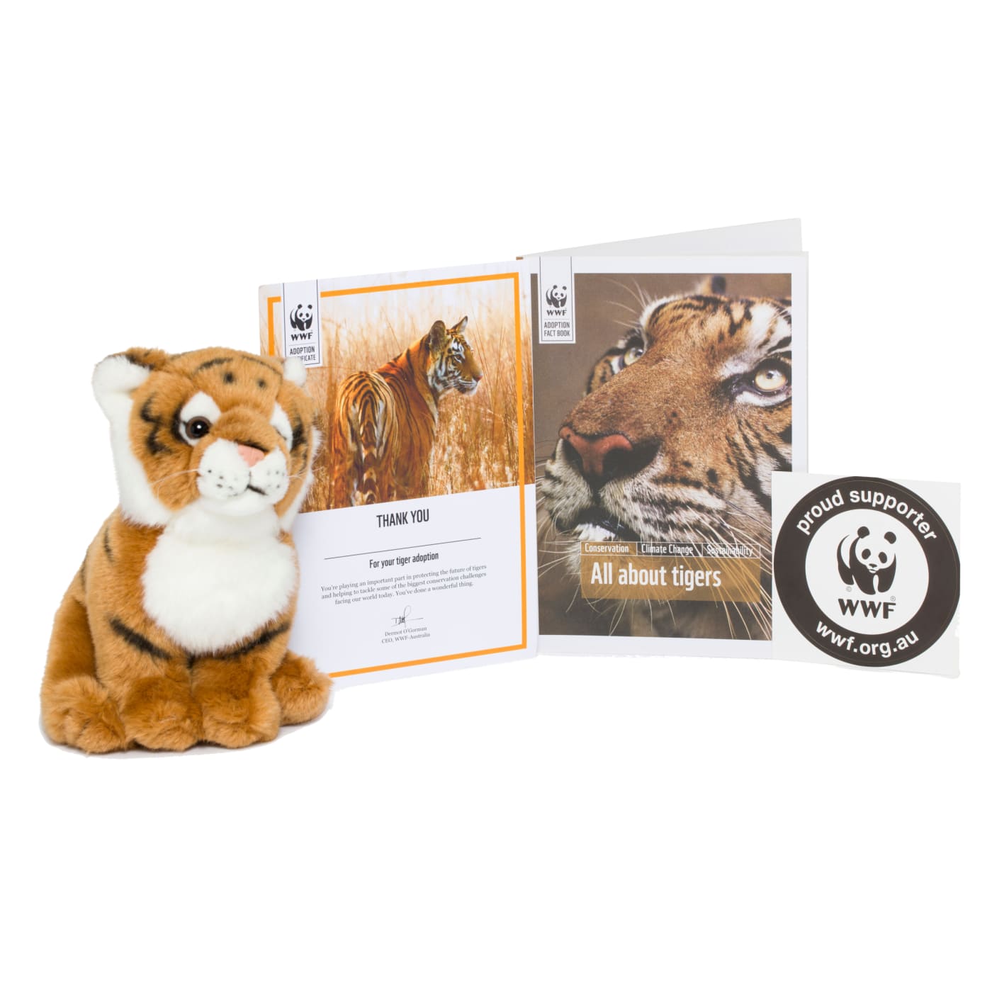 Contents of tiger adoption pack, including tiger plushie, adoption certificate and tiger booklet