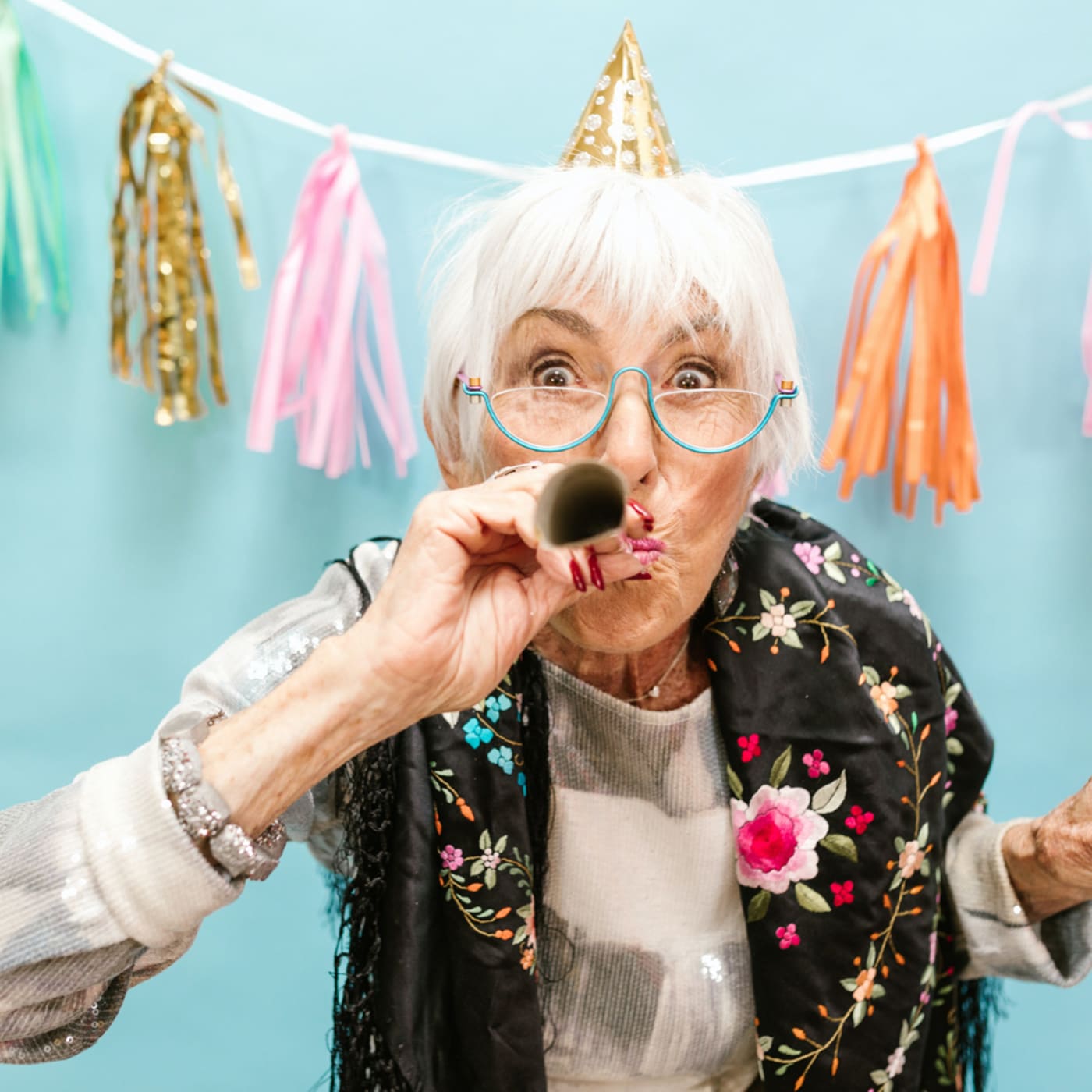 Older woman celebrating at a party