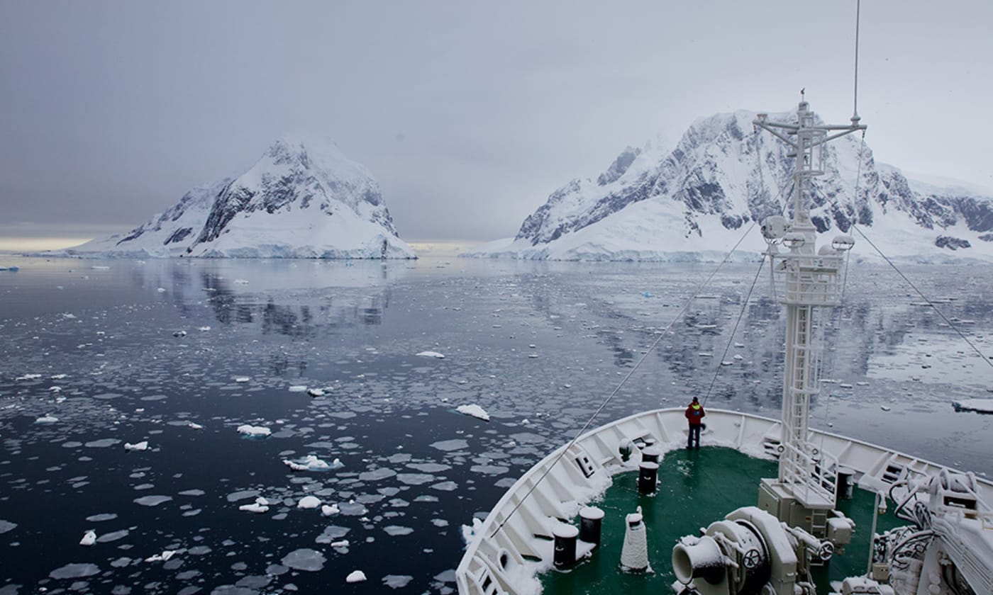 The research ship Akademik Ioffe making its way towards the Lemaire Channel, Antarctic Peninsula