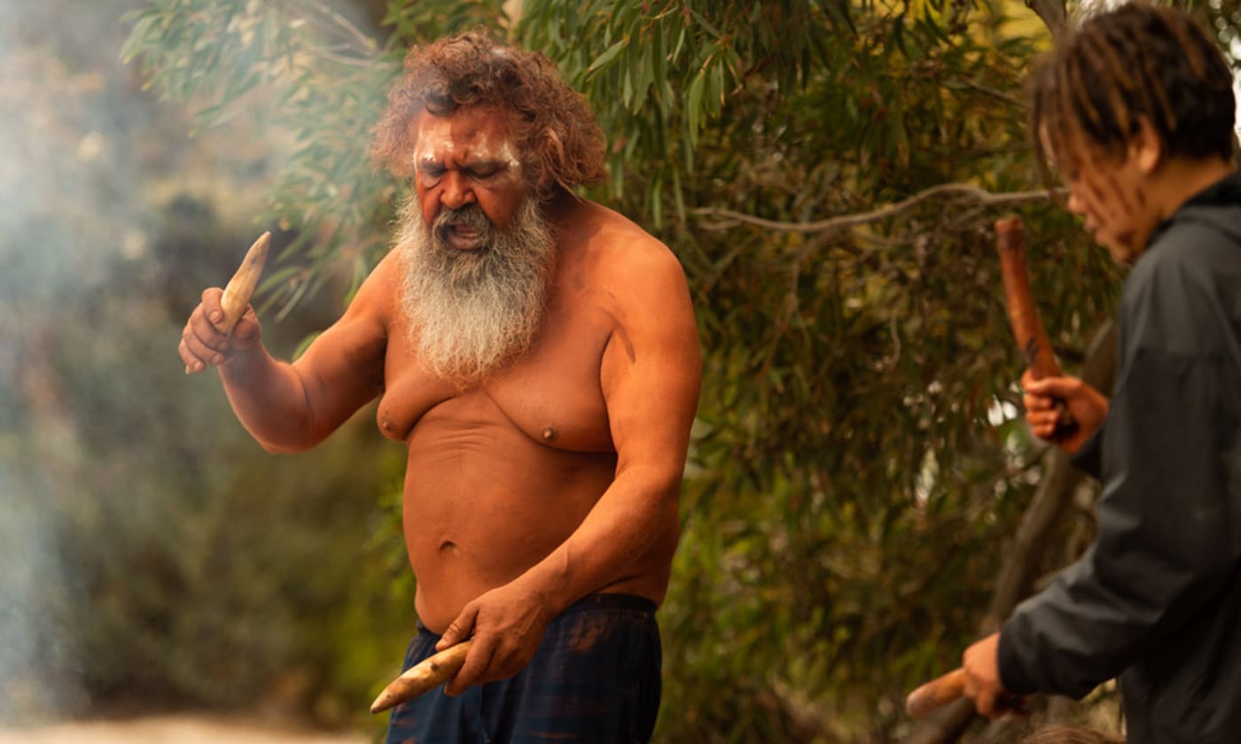 Narungga Elder Quenten Agius performs a traditional smoking ceremony for the return of the brush-tailed bettongs
