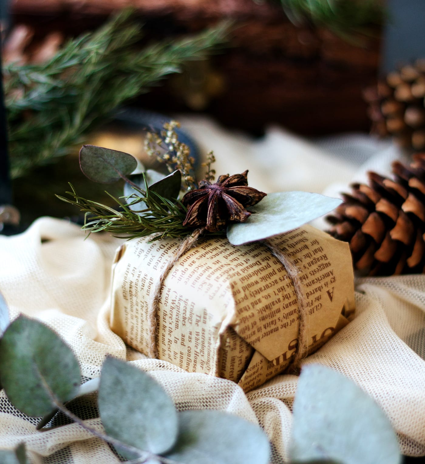 Christmas gift wrapped in recycled newspaper.