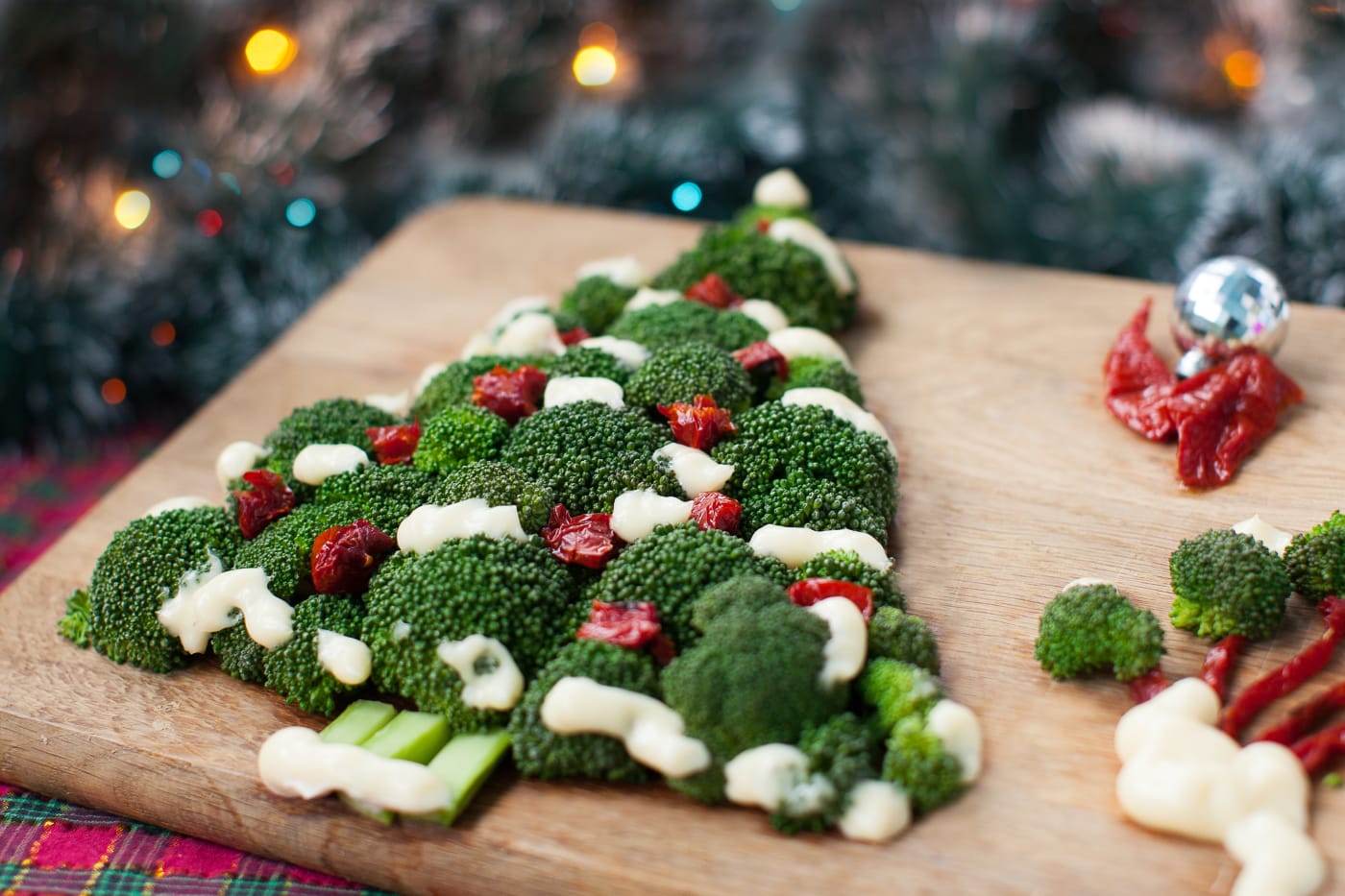 Christmas tree made from broccoli and tomatoes.