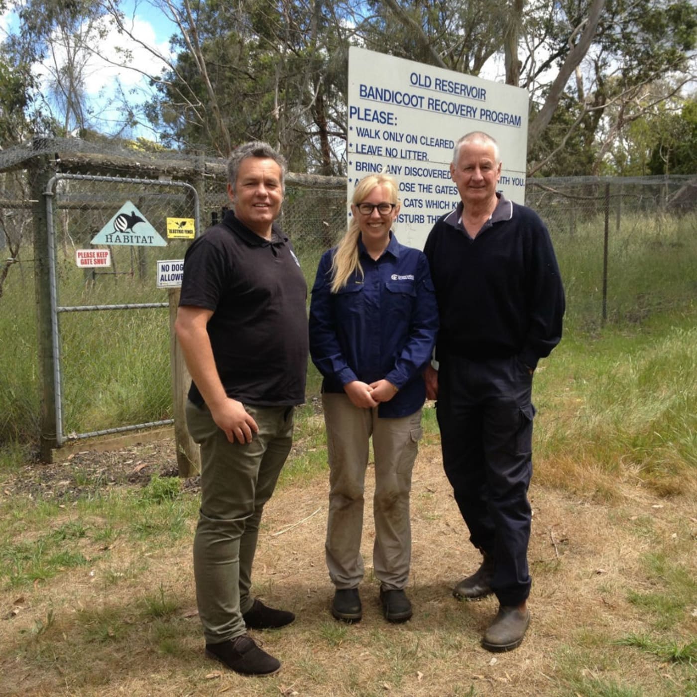 Darren Grover with Kim Volk, Conservation Volunteers project officer, and John Graham, secretary of the Hamilton Institute of Rural Learning