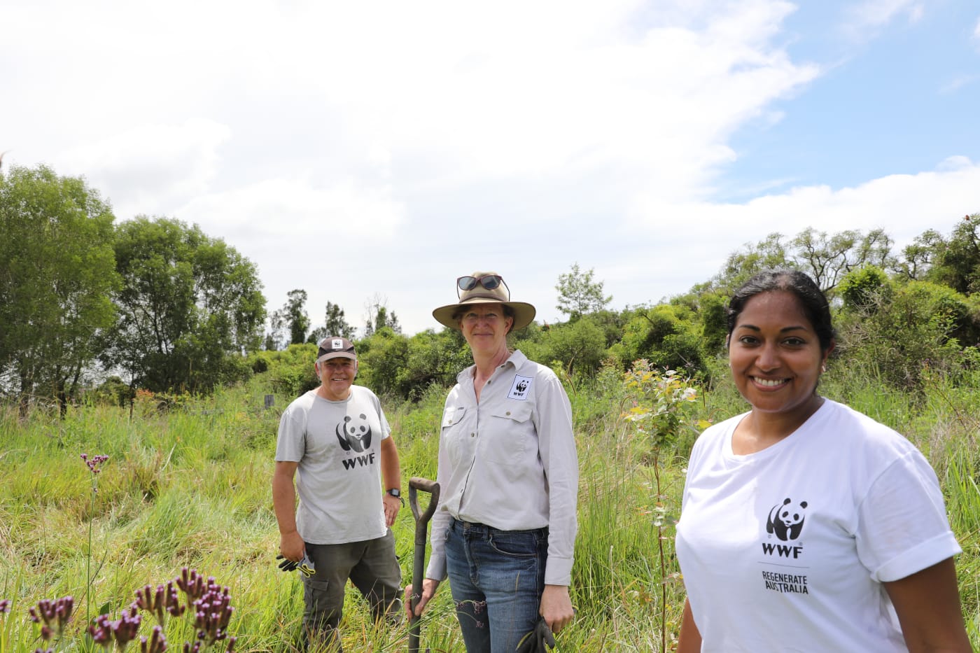 Tanya Pritchard, Darren Grover and Prishani Vengetas at a tree planting event with our partners at Envite in Swan Bay, NSW.