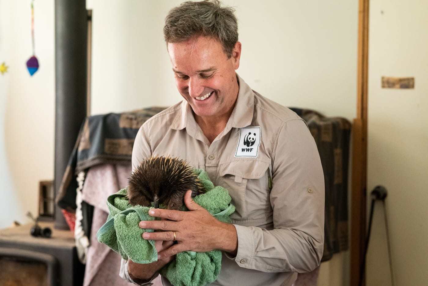 WWF-Australia CEO Dermot O'Gorman meeting Ellie the injured echidna at Wildcare in Carwoola, NSW.