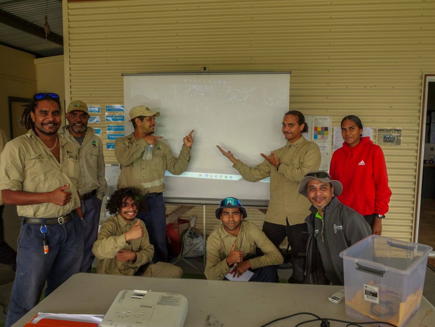 Excited Djabugay Bulmba Rangers moments after seeing an image of a platypus. They had 400,000 images to check but found the platypus image within the first hour