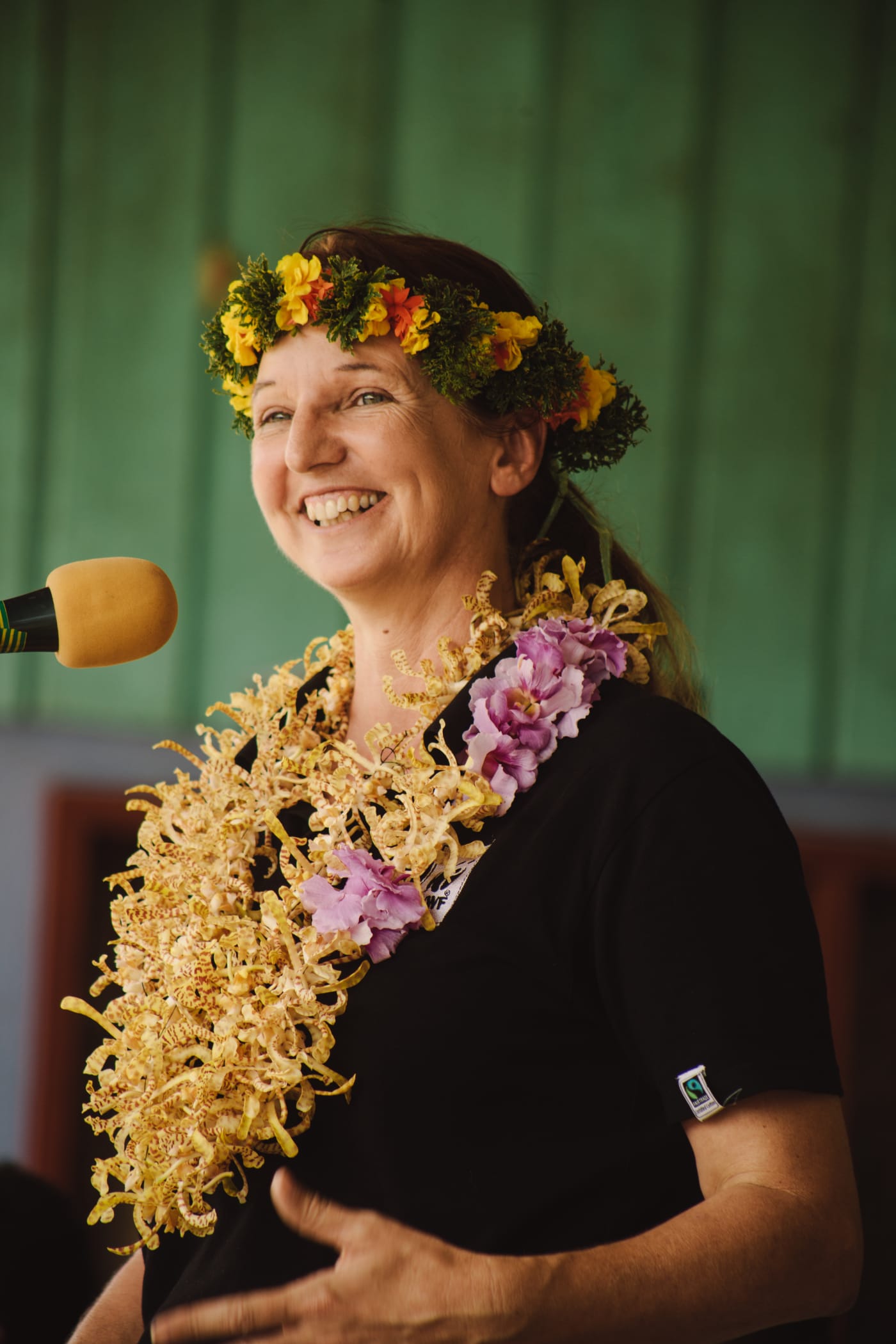 Dr Gilly Llewellyn (WWF-Australia conservation director) giving a speech at the Women's Saving Club at the launching celebration, Gizo, Solomon Islands, 20 June 2014.
On June 20th, 2014 women from the seven zones included within the Gizo and Nusatuva Women’s Saving Club came together in Gizo to celebrate the launching of the Saving’s Club loan component and revolving funds. .The launching event was significant, as it marked the handing over of funds from donors to jump start the loan component of the Saving’s Club. .Saving’s Club members paraded the streets, they delivered speeches to fellow savers and families, they performed traditional dances and songs, and they presented gifts to those who assisted along the way.