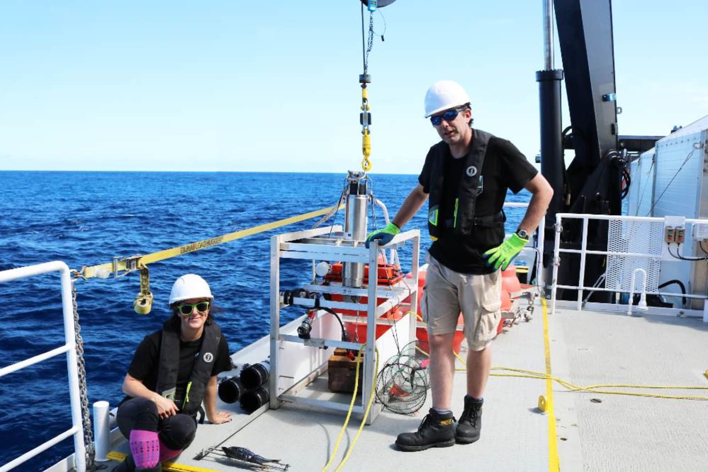 Picture of Johanna Weston and Alan Jamieson on a ship searching for Eurythenes plasticus, a new species of amphipod found living nearly 7 kilometres below sea level that has ingested plastic.