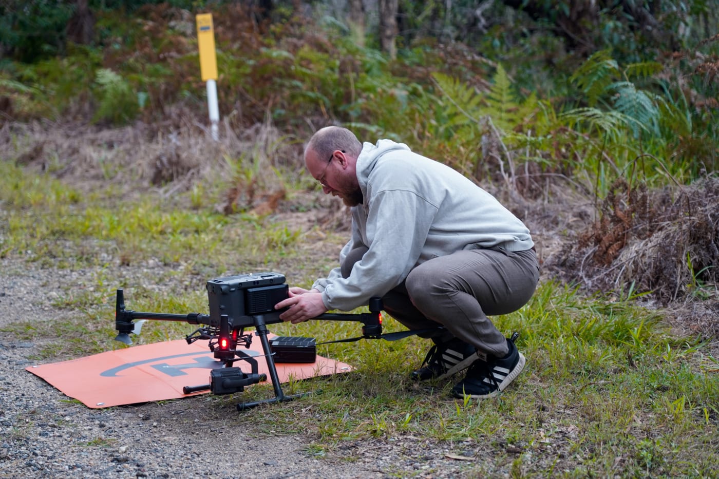 Robotto’s Kenneth Geipel  conducting koala surveys with a thermal imaging drone on Minjerribah (North Stradbroke Island)