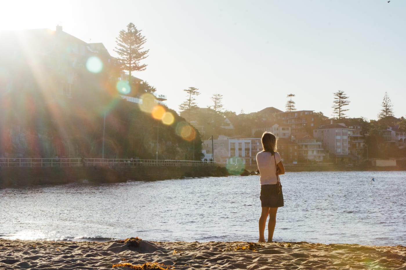 Woman staringout to the sea in Shelly Beach, New South Wales.