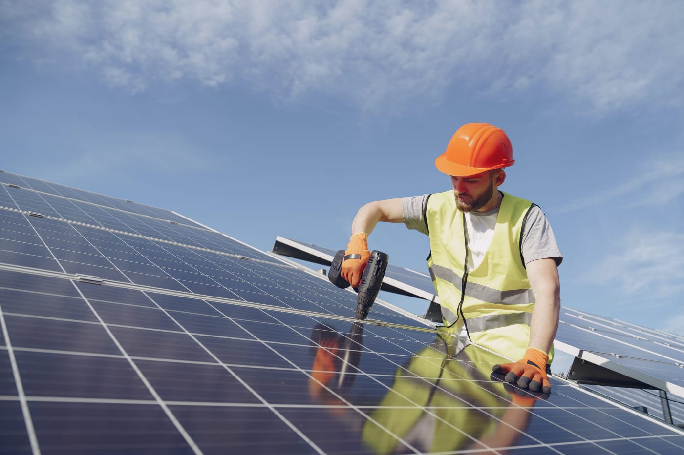 Man installing solar panels