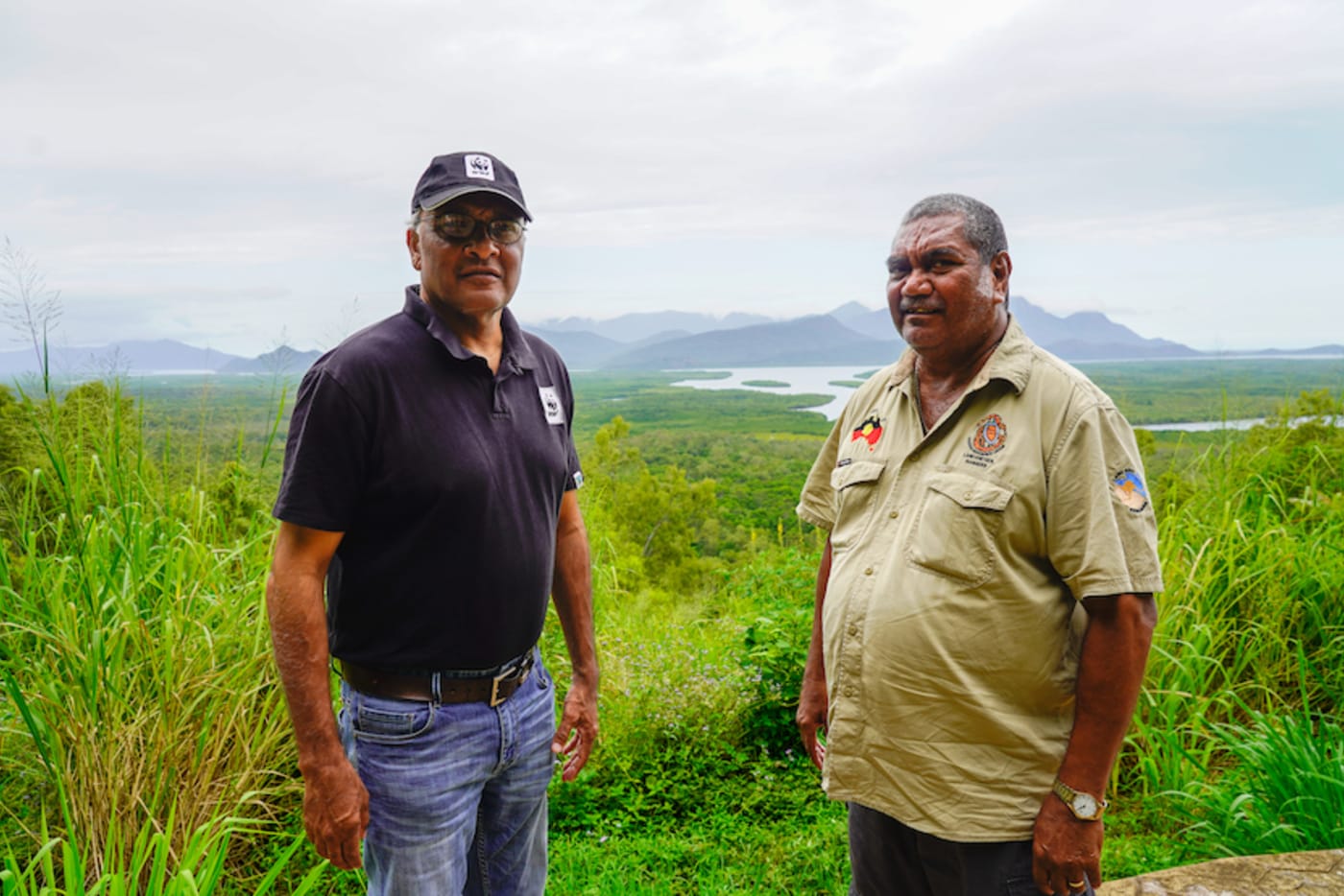 (Pictured L-R) WWF-Australia’s Cliff Cobbo and Uncle Eddie Smallwood ( Gudjuda Reference Group Aboriginal Corporation) overlooking Hinchinbrook Island National Park= part of the Great Barrier Reef World Heritage Area