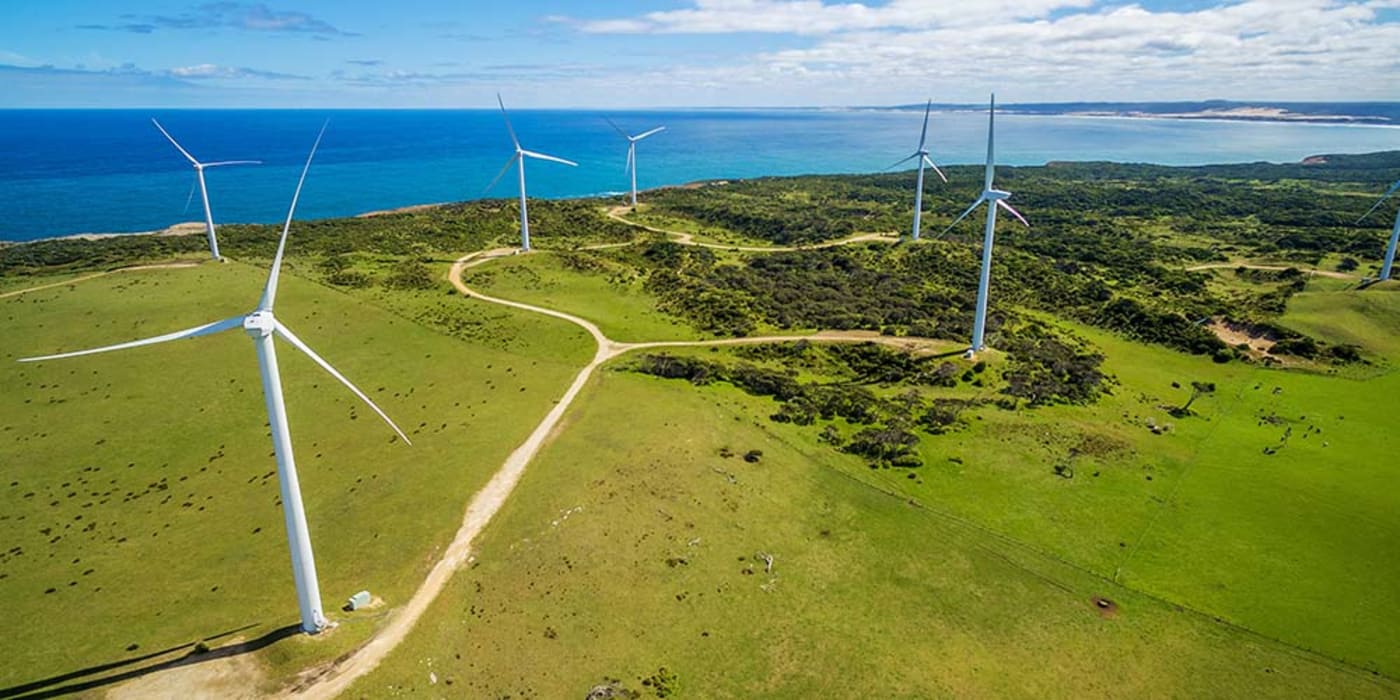 Aerial view of wind farm in rural area on bright sunny day in Australia