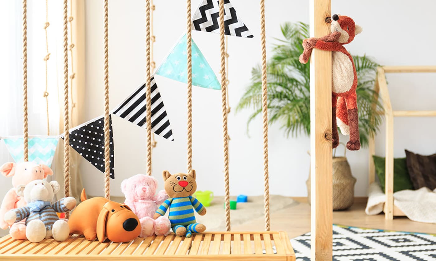 Natural bright baby playroom with eco-friendly fabrics and toys