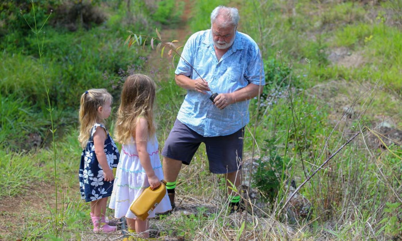 Frank Binkley and his grandchildren planting koala habitat eucalypt trees in Bangalow= NSW