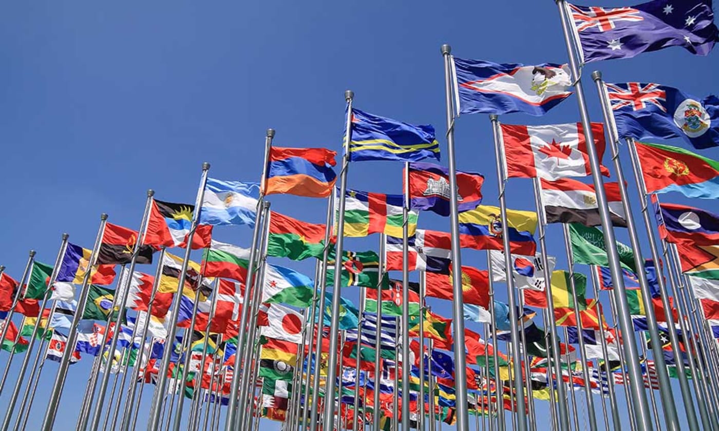 World national flags flying representing nationalities and countries