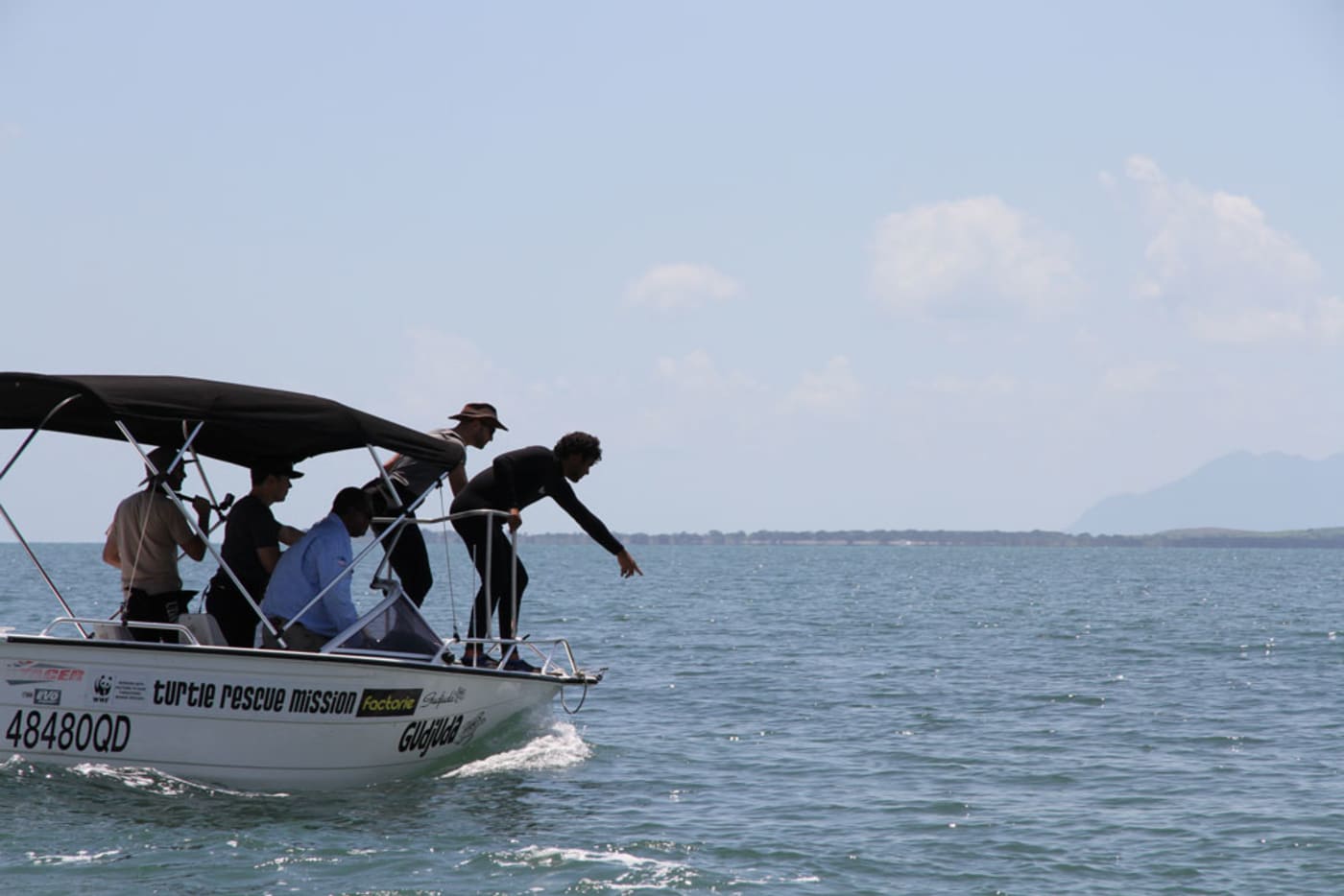 Gudjuda Rangers spotting green sea turtles in Bowen, Queensland