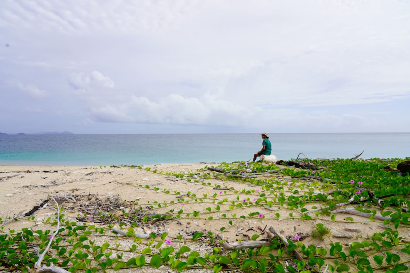 Djiru Traditional Owner Uncle Leonard Andy ( Girringun Aboriginal Corporation) on the beach at Brook Islands National Park= part of the Great Barrier Reef World Heritage Area