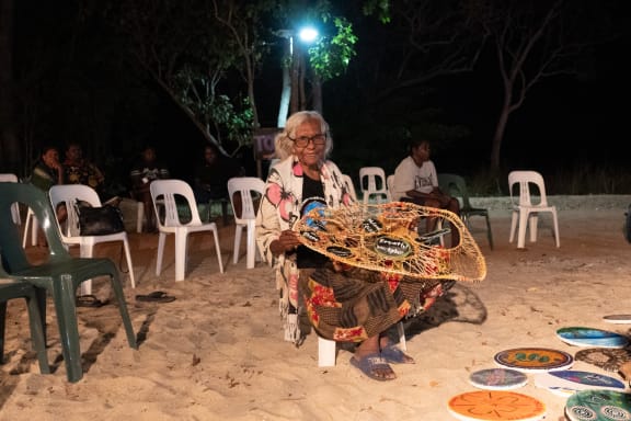 Participants showcasing the finished weaving at the 2023 Strong Women for Healthy Country Forum