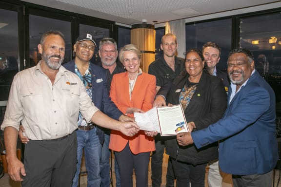 First Nations Statement at the Nature Positive Summit 2024 (Left to Right): Richard Swain- Invasive Species Council, Cliff Cobbo – WWF-Australia, Rowan Foley- Aboriginal Carbon Fund, Tanya Plibersek - Minister for the Environment, Jack Pascoe- University of Melbourne, Josie Alec- ACF First Nations Lead, Joshua Gilbert- ACF Board Member, Barry Hunter - NAILSMA