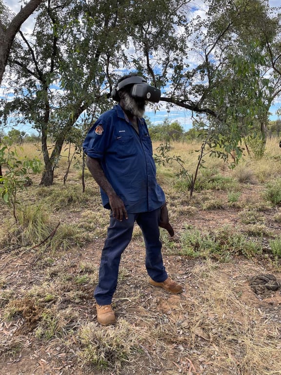 Nyikina Mangala Ranger William Watson using drone vision goggles to search for wiliji in caves on the Erskine Range