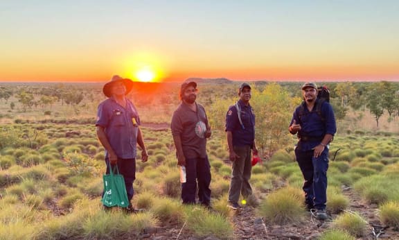 Returning to camp at sunset after baiting Thomas traps set for wiliji on the Erskine Range, Nyikina Mangala Country