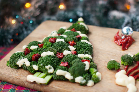 Christmas tree made from broccoli and tomatoes.