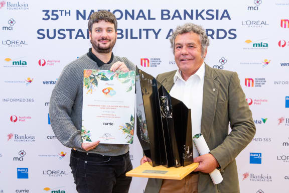 Darren Grover and Djarra Delaney accept the Banksia Award for Marketing and Communicatins for Impact Award for the Net Free Reef campaign at the Banksia Awards 2024
