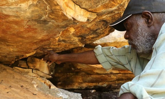 Ian, Traditional Owner of Nyarinyin (Wilinggin) country, searching for scats in suspected Nabarlek territory, August 2015