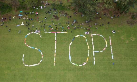 Manyana Matters aerial of STOP sign during protest