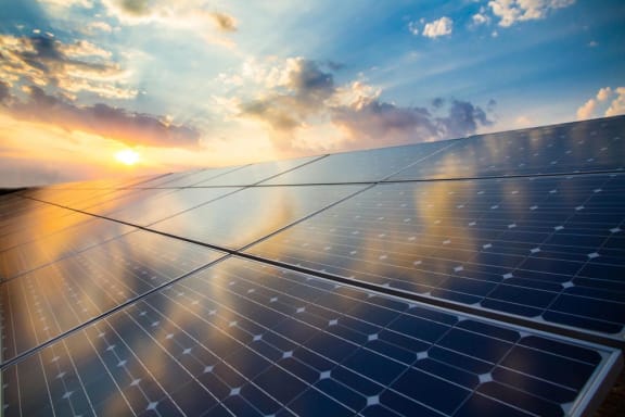 Solar panel with sunset background