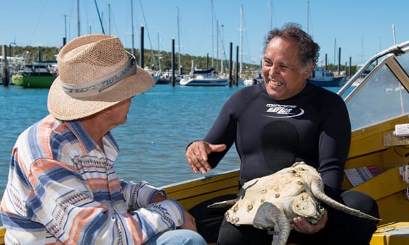 Tony Bugeja= cane farmer and Jim Gaston= Birri Gubba Juru Elder= turtle tagging= Bowen= North Queensland