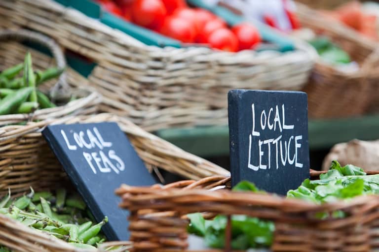Local food (market) for sale at a shop in Cley Next the Sea, Norfolk, UK. Buying local produce helps to cut down massively on food miles.