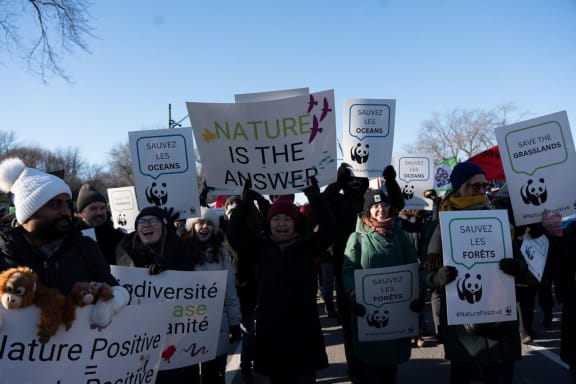 WWF at COP15 in Montreal, Canada with signs