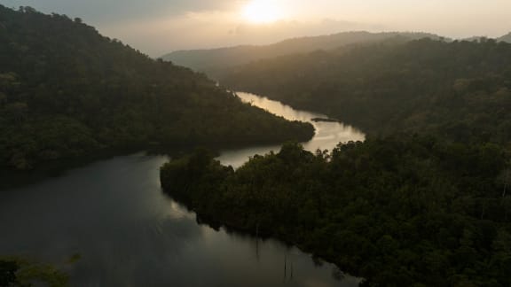 The sun sets on Royal Belum State Park, Malaysia.