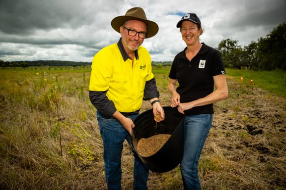 Ben O'Hara and Tanya Pritchard Drone Seeding Mix in Hidden Vale, QLD