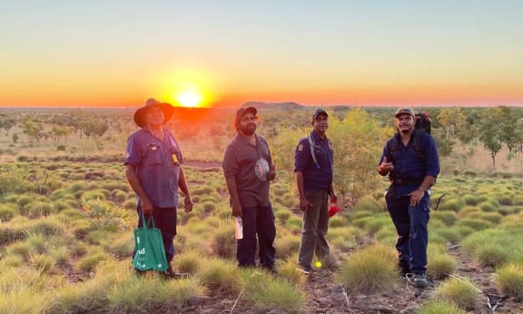 Returning to camp at sunset after baiting Thomas traps set for wiliji on the Erskine Range, Nyikina Mangala Country