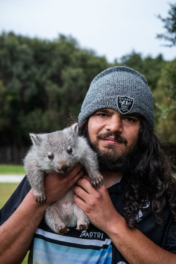 Pakana Ranger Baden Maynard and Louie the wombat