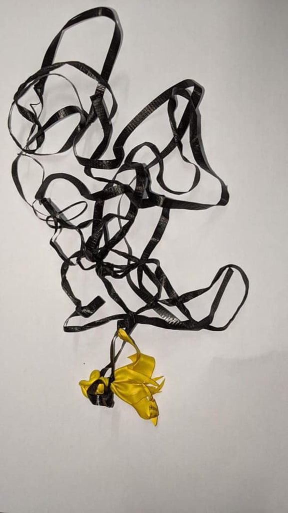 Yellow balloon and 252cm string found in sea turtle