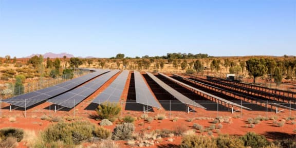 Solar panels and wind turbines at a renewable energy research station in Perth, Western Australia