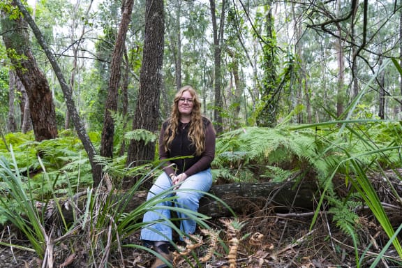 Takesa Frank in a forest at Narrawallee.