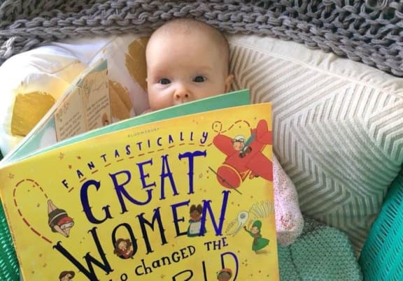 Josie reading Women Who Changed the World