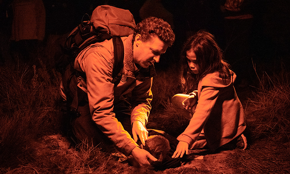 WWF-Australia's Rob Brewster and Narungga youth release a bettong on Guuranda (Yorke Peninsula)