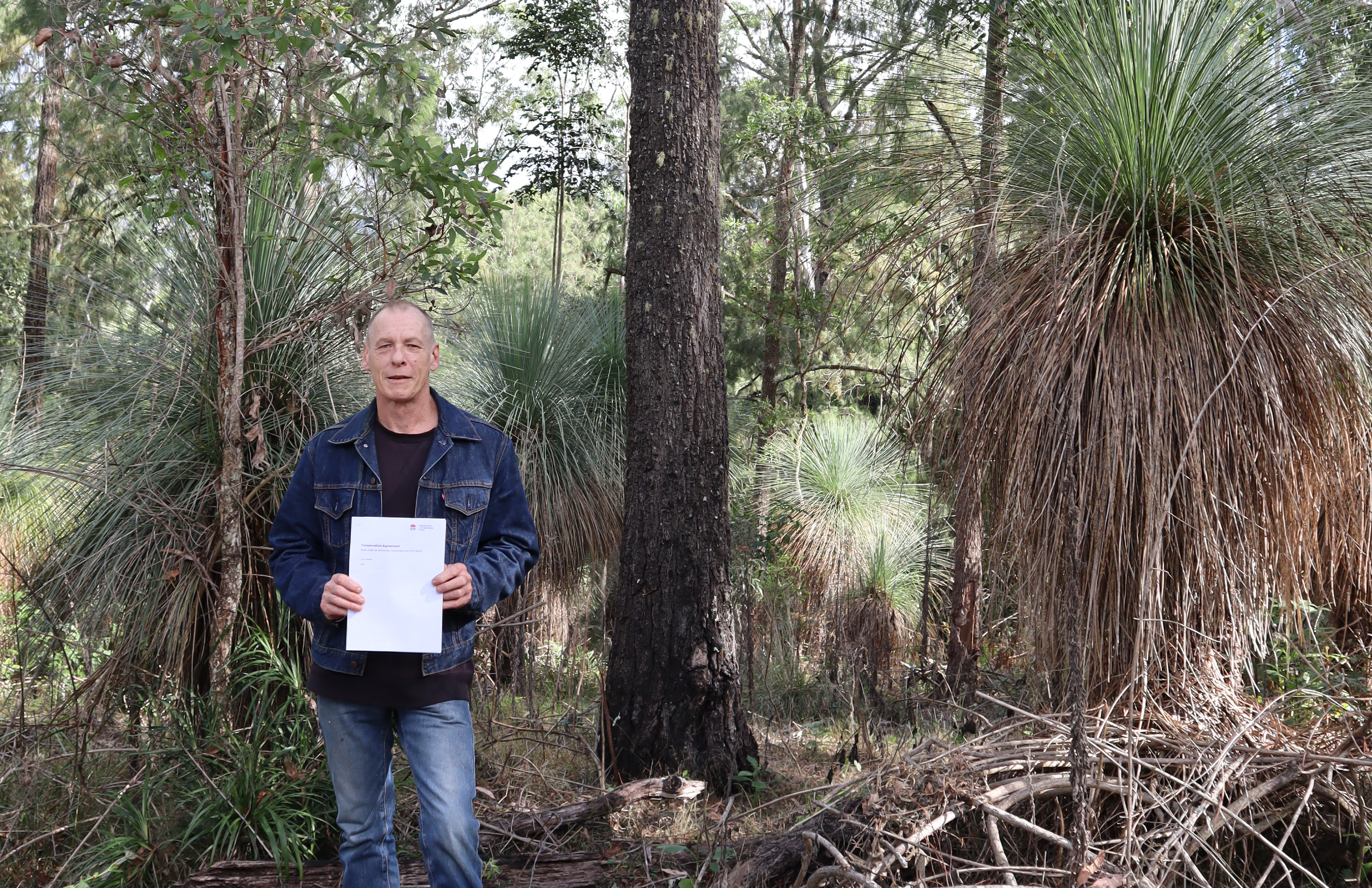 Tony Rowland on his Kyogle property holding his conservation agreement